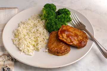 salisbury steak  with rice and broccoli