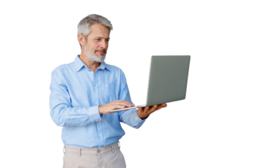 Senior grey-haired businessman focused on laptop, typing and working online in casual shirt, isolated on transparent background