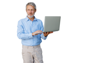 Mature man standing, holding and typing on laptop, networking, connecting online, working remotely, transparent background