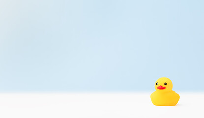 light blue background with a yellow rubber duck