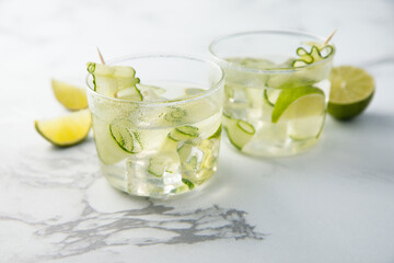 Refreshing drink with lime and cucumber