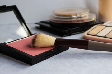 Blush and brushes in soft pastel shades, perfect for modern beauty brands, skincare promotions, and influencer content.