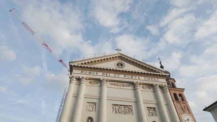 Rovigo cathedral facade under blue skies in italy