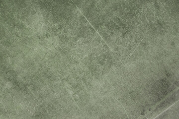 old damaged textile of pale green color