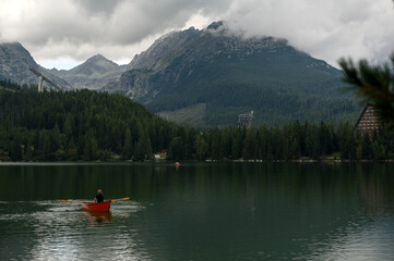 Rowing on a Serene Mountain Lake