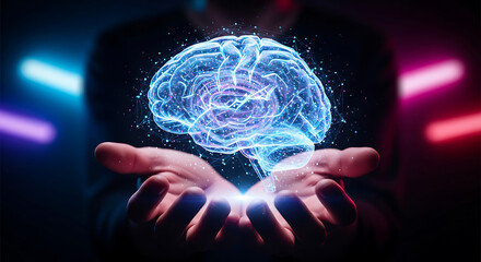 A person's hands holding a glowing, futuristic, holographic brain with particles floating around it.