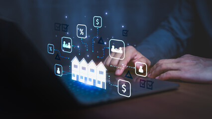 Businessman using laptop with digital real estate icons, showing property investment, mortgage rate, housing data, rent, and financial analytics concept in smart technology and real estate market.