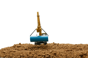 Crawler excavators are digging soil at construction site and laying pipe. with isolated white...