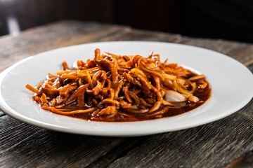 Hoisin chicken pancakes on a wooden background. Chinese cuisine. Asian food. Food concept