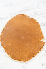 Preparing and Baking Classic Gingerbread Cookies in Gingerbread Man Shapes