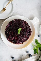 Homemade Blueberry upside down cake with white chocolate drizzle