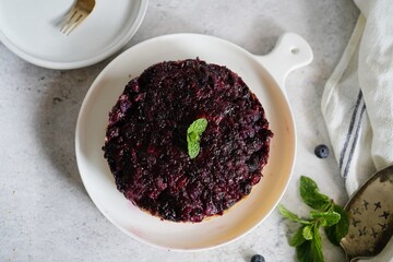 Homemade Blueberry upside down cake with white chocolate drizzle