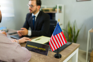 Immigration lawyer advising client on legal procedures