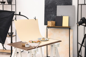 Shooting tasty pastries with camera in studio. Professional food photography