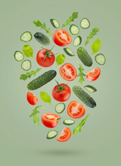 Fresh vegetable salad ingredients - red tomato, green cucumbers, leafy greens fly as art flow composition on green background. Summer healthy eating, organic food for advertising, design, branding.