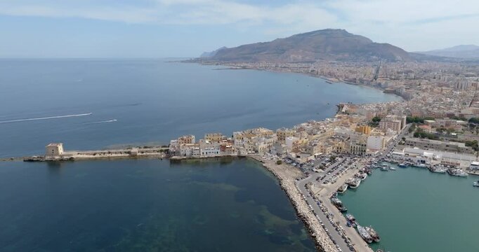 Aerial view of Trapani, Sicily, Italy. It is a Sicilian city overlooking the Mediterranean Sea. Mount Erice dominates the town in the background.