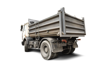A dump truck against an isolated background, used for transporting soil and other construction materials. Its readiness for construction work underscores its efficiency. Equipment rental.