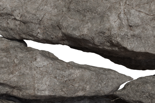 Close-up of rugged, grey rock surface with a deep, dark fissure running horizontally. Textured stone with shadows and highlights emphasizing its natural, raw form