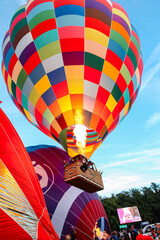 Colorful Hot Air Balloon Festival &mdash; inflating balloons and burner flames