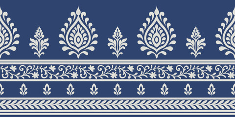 Indian ethnic pattern with elegant floral and leaf motifs in cream on blue background creating beautiful traditional design