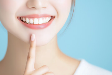 Obraz premium 美しい健康な歯を見せて笑う女性の口元アップ