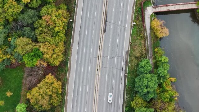 Beautiful drone view of the Don Valley Parkway, Riverdale Park and the Don River in autumn in Toronto, Ontario, Canada.