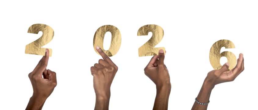 2026 New Year celebration. Black-skinned male hand holding golden metallic numbers with shiny