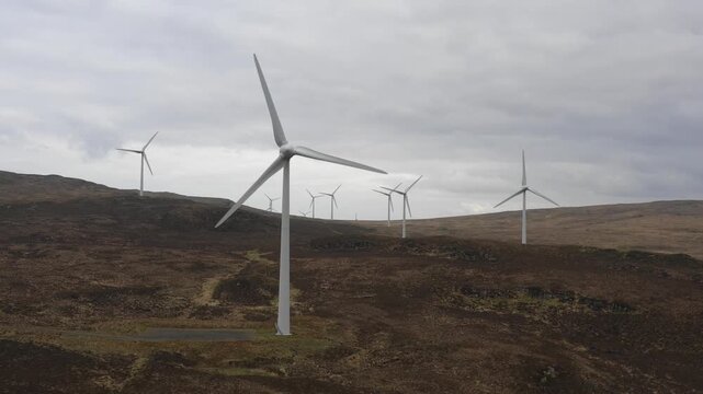 Wind farm in Scotland with turbines for electrical energy generation