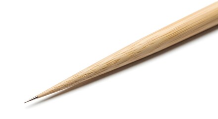 Obraz premium Close-up of a wooden calligraphy pen on white background