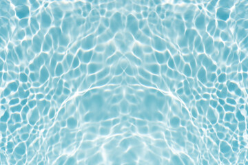 Blue water with ripples on the surface. Defocus blurred transparent blue colored clear calm water surface texture with splashes and bubbles. Water waves with shining pattern texture background.