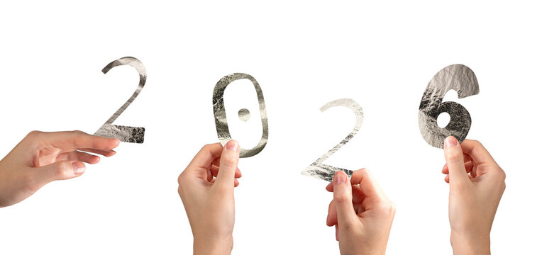 Hand holding silver metallic 2026 number in festive New Year celebration. Shiny textured foil - Powered by Adobe