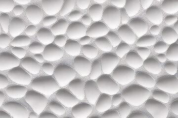 Abstract surface of smooth, rounded stones, creating a textured, organic, and calming visual pattern.