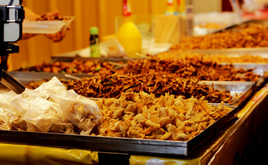 Crispy fried snacks are sold at the Asian night market.