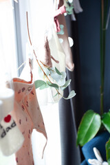 Baby shower setup with pastel balloons, cake and wrapped gifts on a cozy table, soft natural light and copy space&mdash;perfect for invitations and social posts.