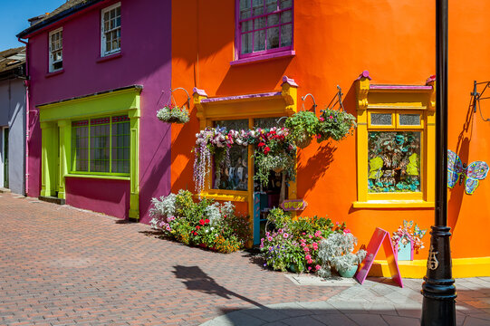 Quaint street lined with vibrant colorful buildings in the Old Town of Kinsale, County Cork, Ireland