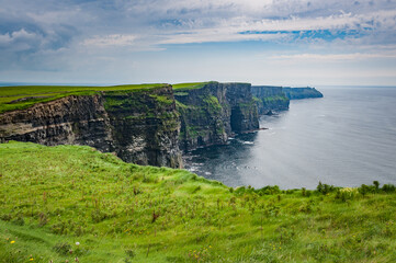 Beautiful scenery of the Cliffs of Moher in County Clare, Ireland.
View of the cliff and the Atlantic Ocean.