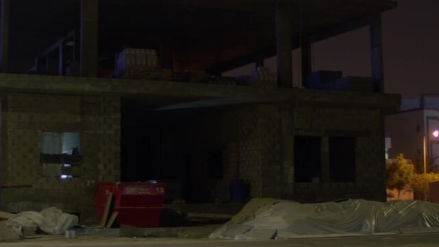 Building under construction and surrounding apartment buildings in Sar, Bahrain