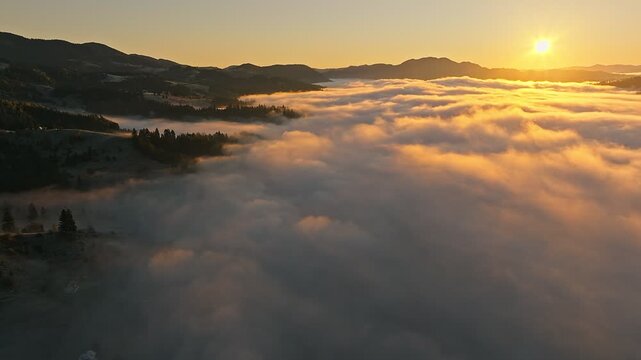 The Beautiful and Stunning Sunrise Over a Foggy Landscape Scene