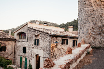 Palma de Mallorca old town alley at golden hour, Spain