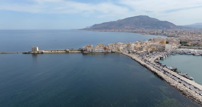 Aerial view of Trapani, Sicily, Italy. It is a Sicilian city overlooking the Mediterranean Sea. Mount Erice dominates the town in the background.