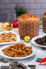 Homemade sweet bread filled with chocolate, dried fruits, walnuts, almonds, peanuts, candied nuts, raisins, and fruit, Christmas and Thanksgiving holiday bread. 