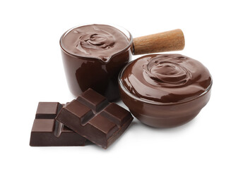 Melted chocolate and pieces isolated on white