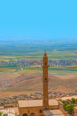 Mardin Sehidiye Mosque Mesopotamia in the background - Mardin, Turkey