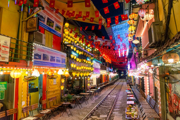 Lively Hanoi Train Street Cafes at Night
