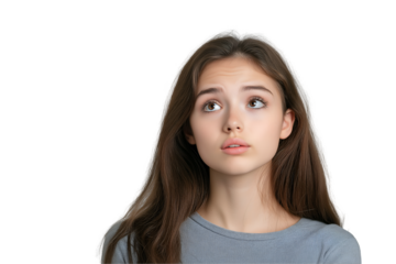 Portrait of a young woman looking upward with a pensive expression. Ideal for concepts like doubt, thinking, idea generation, or curiosity.