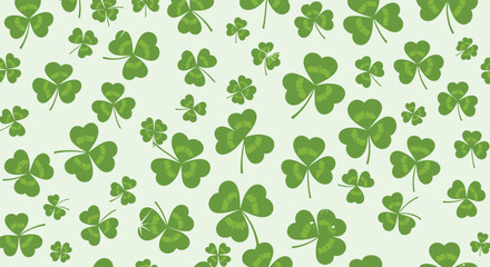 Green shamrock and lucky four-leaf clover seamless pattern on a light background, symbolizing good fortune and St. Patrick's Day.