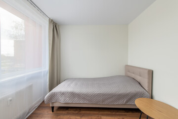 Minimalism Children, Young Adult Living Room Interior. Bed and Coffee Table. Windows and Curtains. LED Light