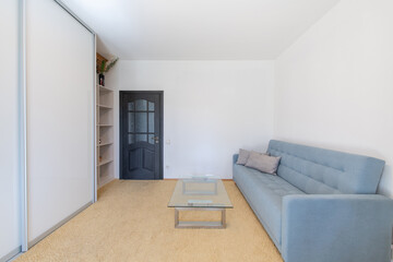 Minimalism Children, Young Adult Living Room Interior. Couch and Table.