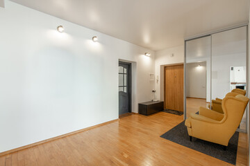 Home Entrance Hall. Interior. Wooden Door, Brown Flooring and White Walls. Minimalism. LED Light.