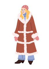 Smiling woman in long brown fur coat with mittens hat and boots dressed for cold winter weather